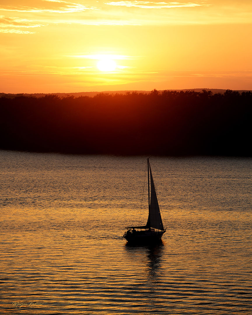 Sailing boat in sunset